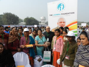 With widows and Modi banner in backdrop